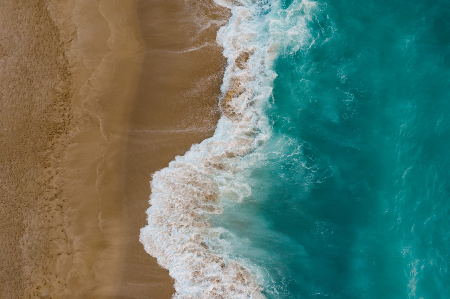 top view of sand meeting seawater

Image by ArthurHidden on Freepik
